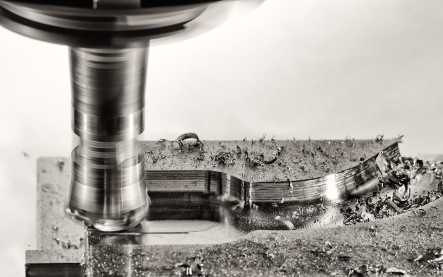 Milling cutter work with splinters flying off, monochrome versio